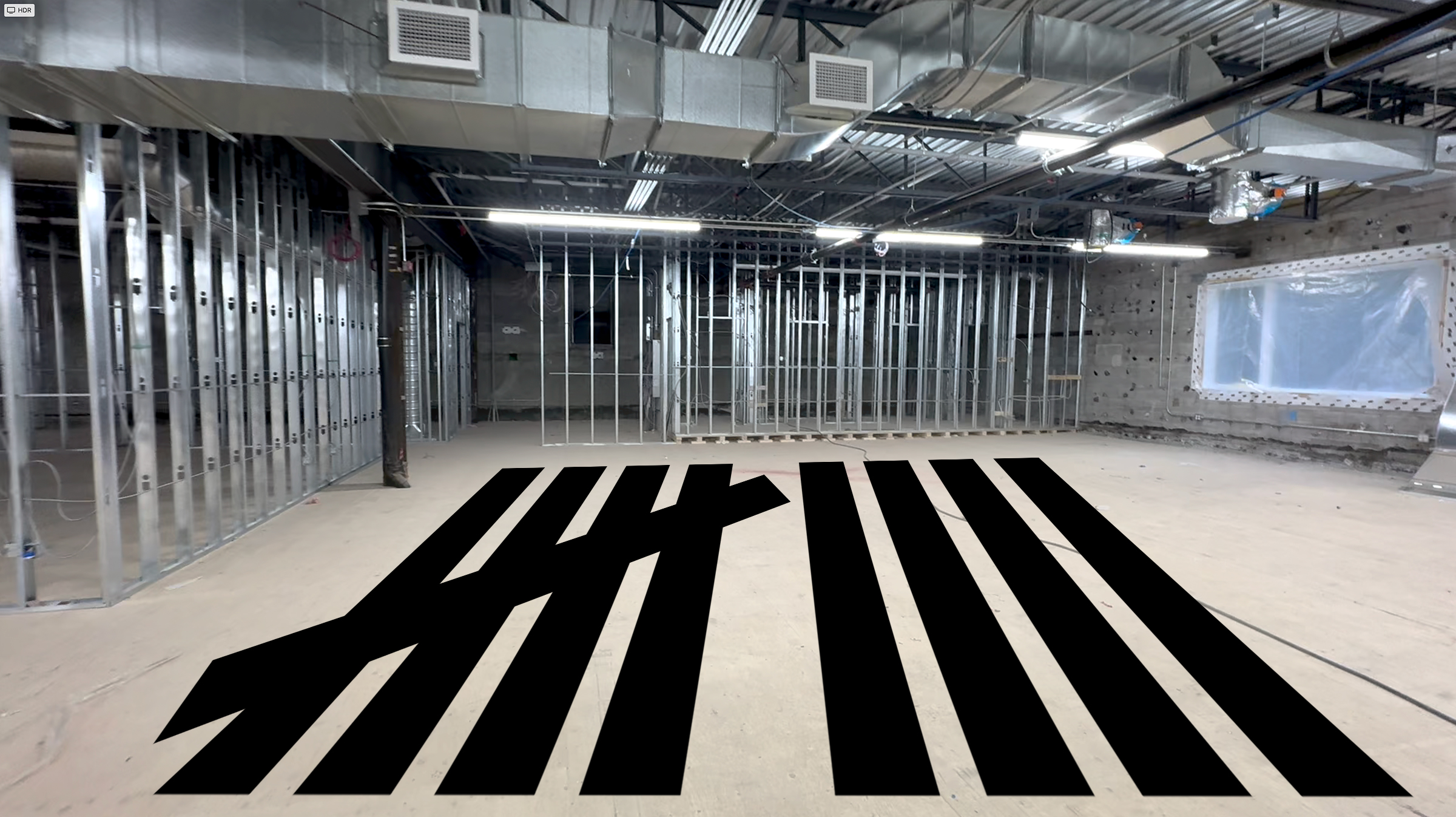 The chapter9guitars shop under construction, logo on the floor
